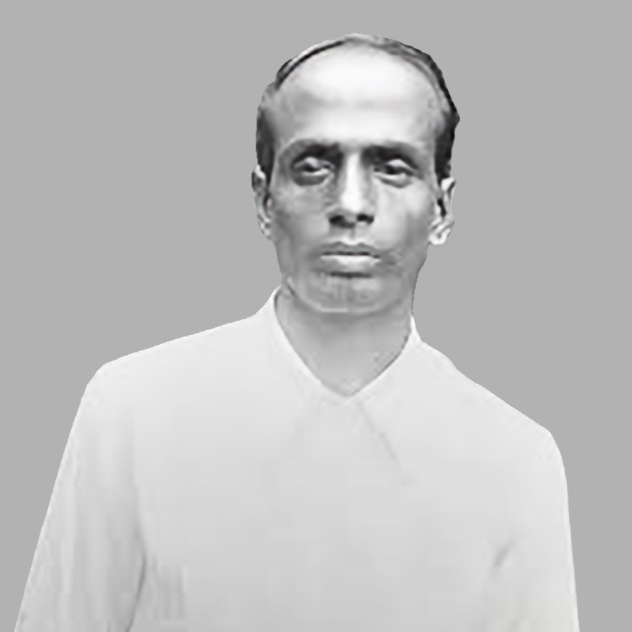 Monochrome portrait study of Surya Sen, shown head and shoulders against a plain background.