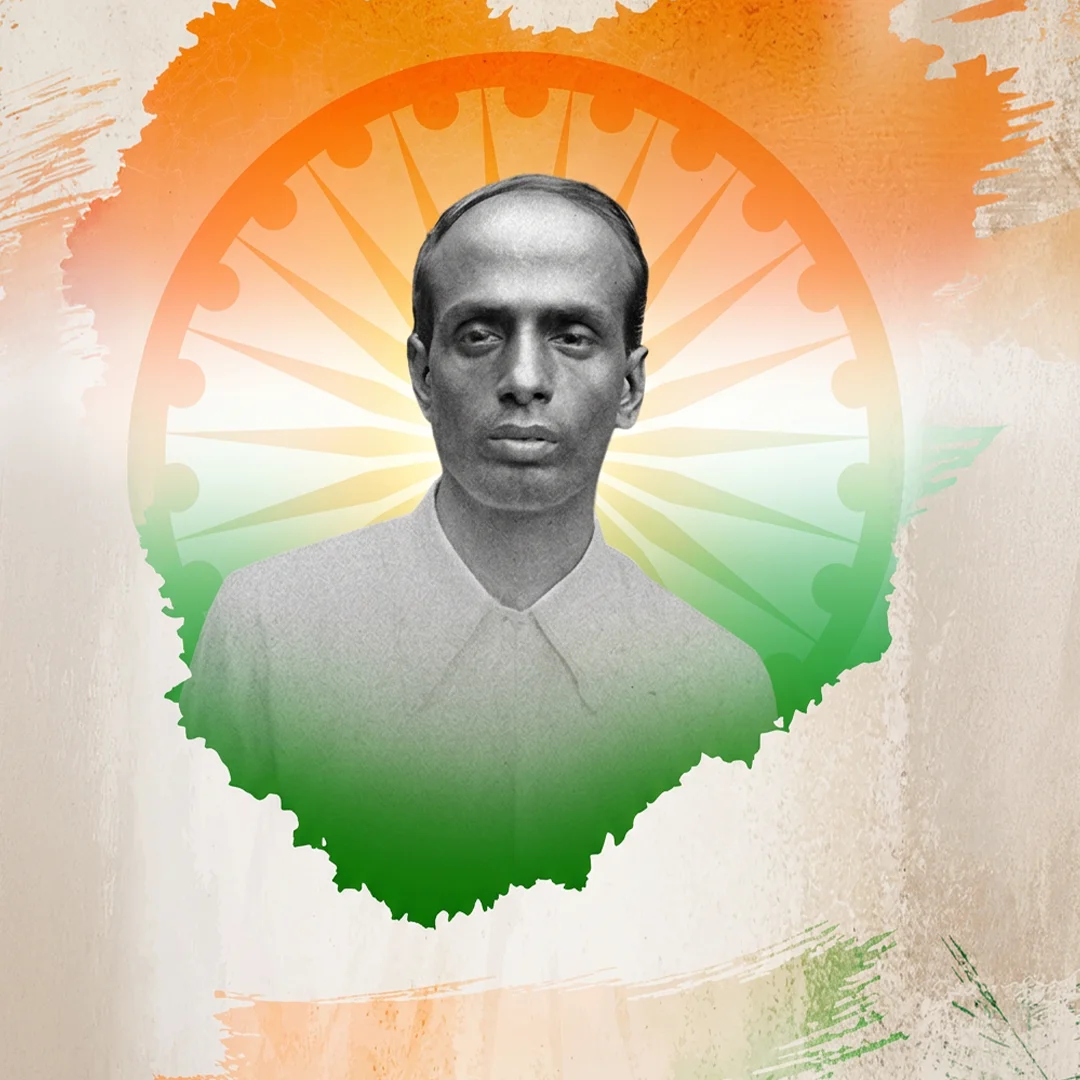 Modern commemorative graphic: the archival photograph of Surya Sen set within a stylised Ashoka chakra and Indian tricolour brushwork on a textured ground.